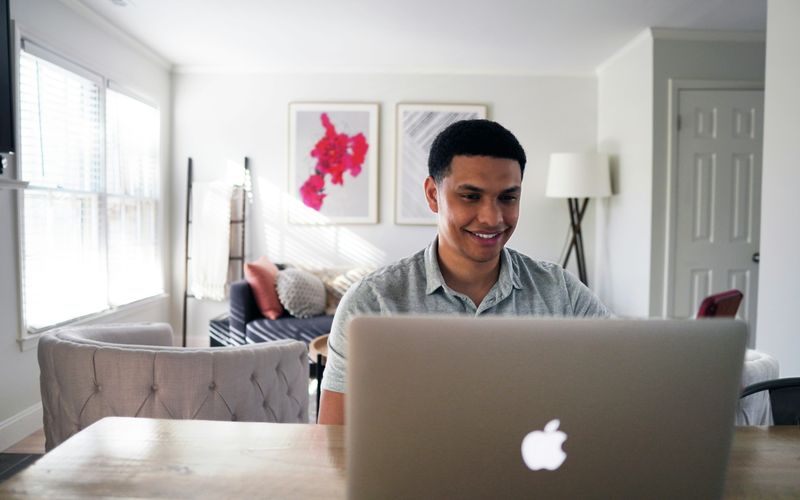 Candidate completing an online exam at home in a quiet environment